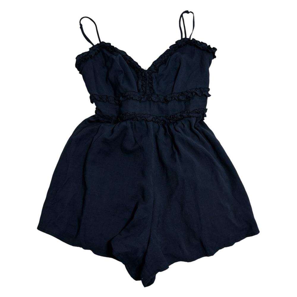 Francesca’s Mi Ami navy ruffle romper